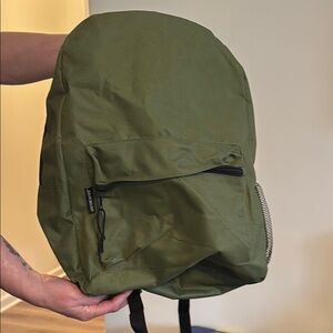 Green Canvas Backpack with Rounded Shape and Durable Material